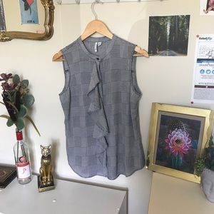 Ruffle button down tank top.